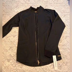 Women’s Lauderdale scrub jacket. Black with gold hardware. Size: XS